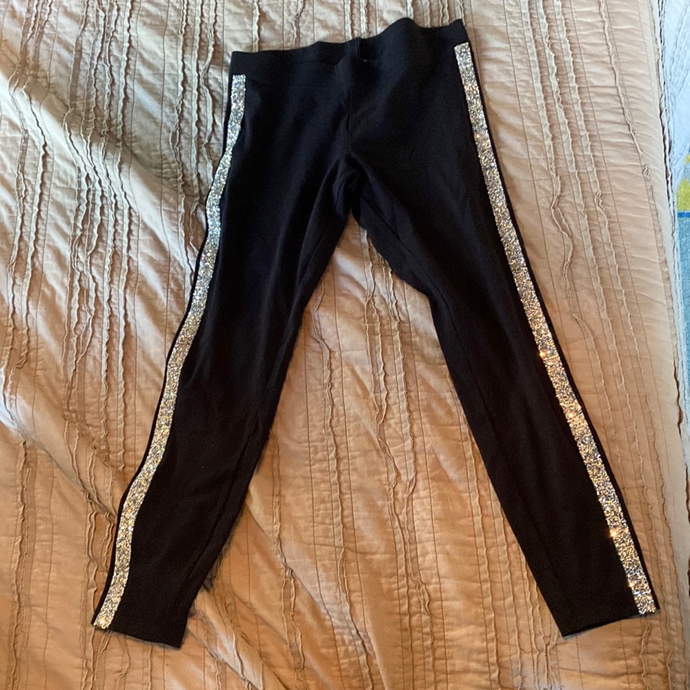 Express leggings with glitter stripes down both legs.
